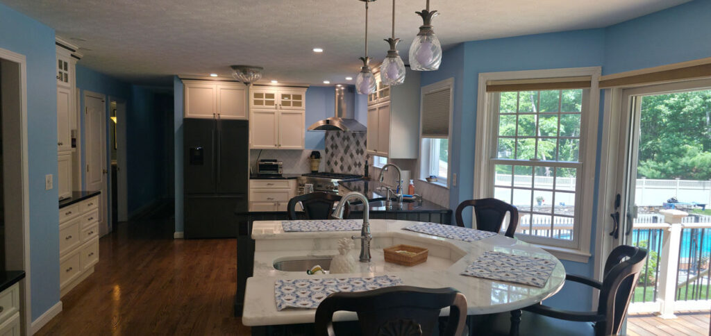 Cramb Painting Co. recently completed a full interior painting project in this beautiful Westford home, including the kitchen, walls, trim, ceilings, and floors.